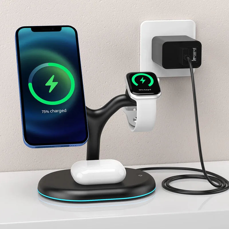 Black magnetic wireless charging stand holding an iPhone vertically on a desk
