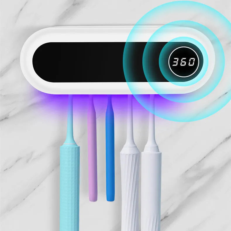 Ivory White wall mounted UV toothbrush steriliser holder with digital display and toothpaste squeezer.