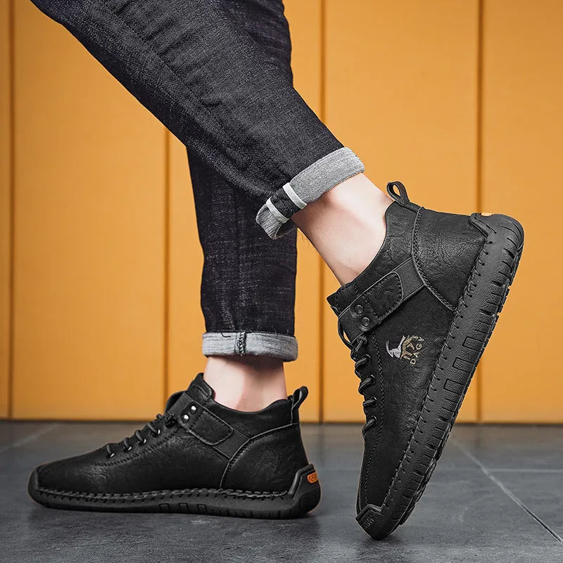 Men's casual sneakers in black with microfiber upper, rubber sole, lace-up front, and car stitching detail