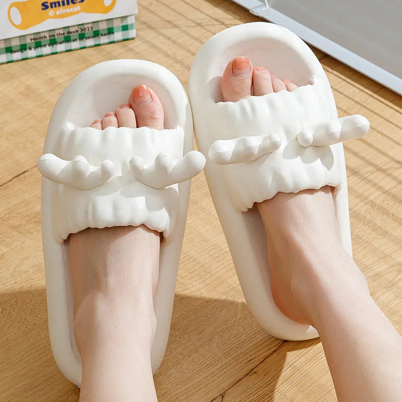 Deer horn design EVA flip flop slippers in light yellow, showing hollow out pattern and non-slip sole.