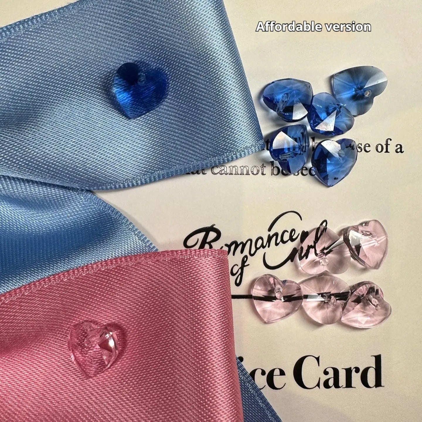 Blue princess style dog hair band with adjustable bow on a dog's head.