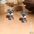 Flat cartoon acrylic Schnauzer dog earrings in Christmas style on a light background