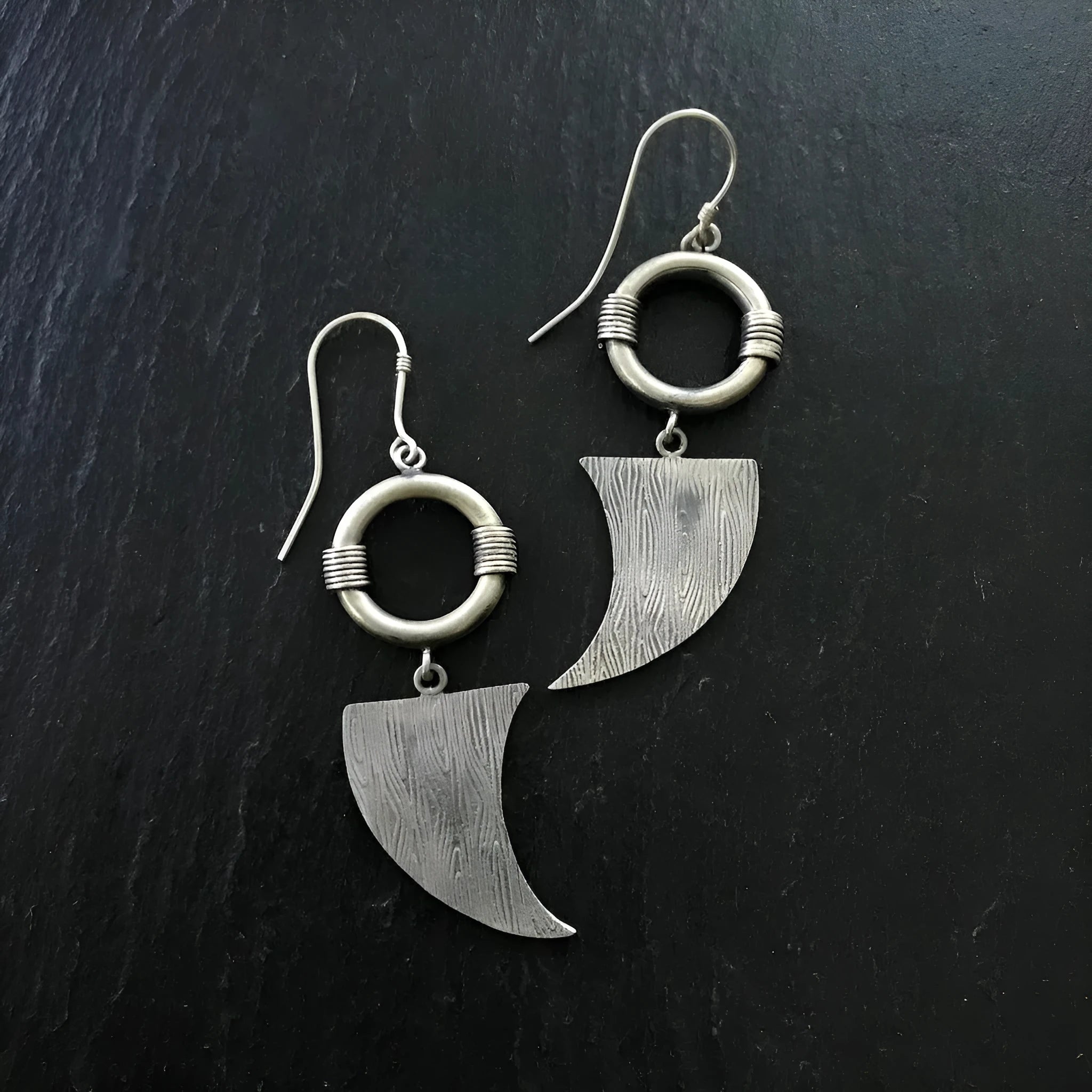 Retro women's earrings with antique silver snake design and electroplated finish on alloy.
