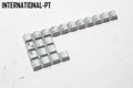 Keyboard with sublimation-printed international symbols for multiple European language layouts on keycaps.