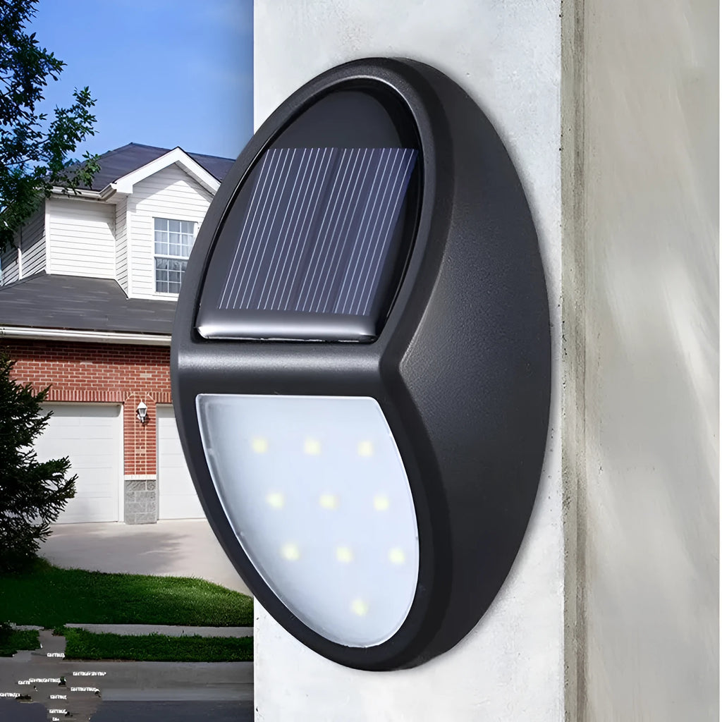 Black solar-powered LED wall light with automatic light sensor for outdoor use