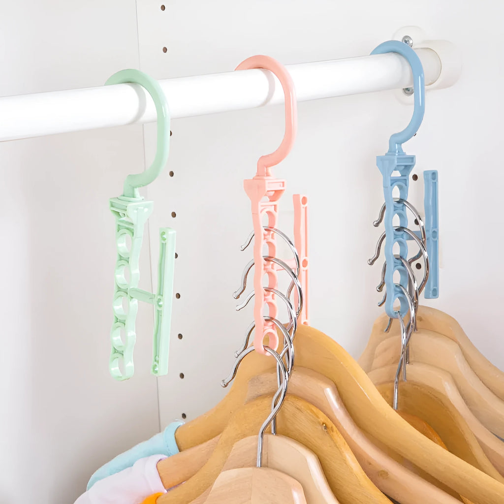 Blue revolving wardrobe hanger with five rotating branches and a top handle.