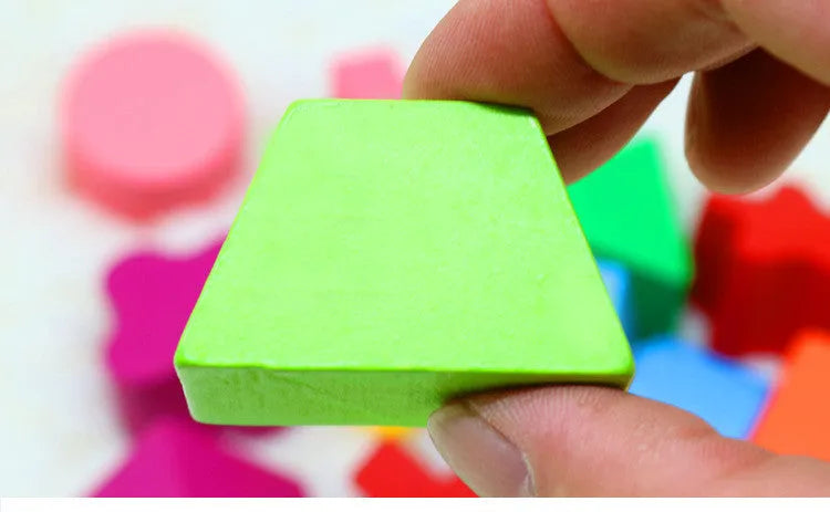 Wooden shape matching building blocks in pine wood with water-based paint, supplied in a sixteen hole intellectual box for children over 1 year old.