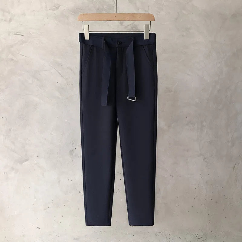 Boys slim straight wool trousers in tapered fit, shown in light grey colour.