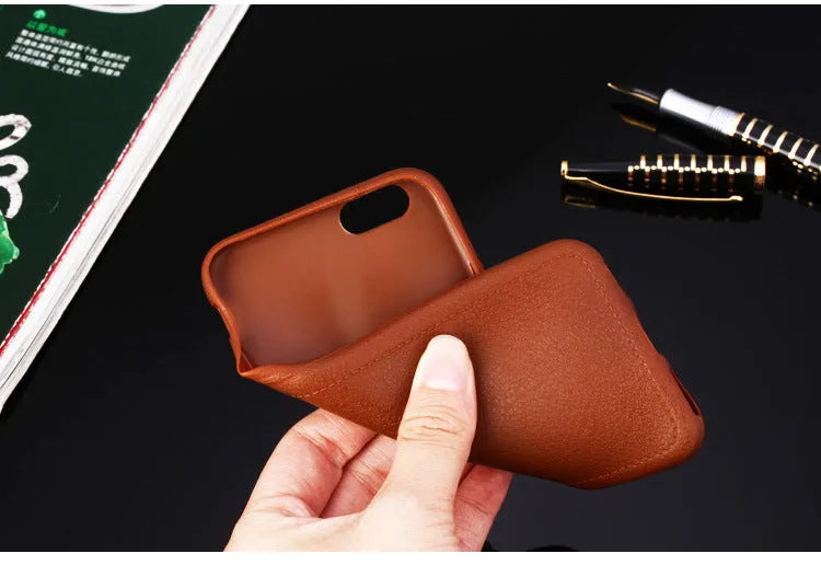Leather finish TPU iPhone case in Black, Brown, Navy Blue or Wine Red with raised edges