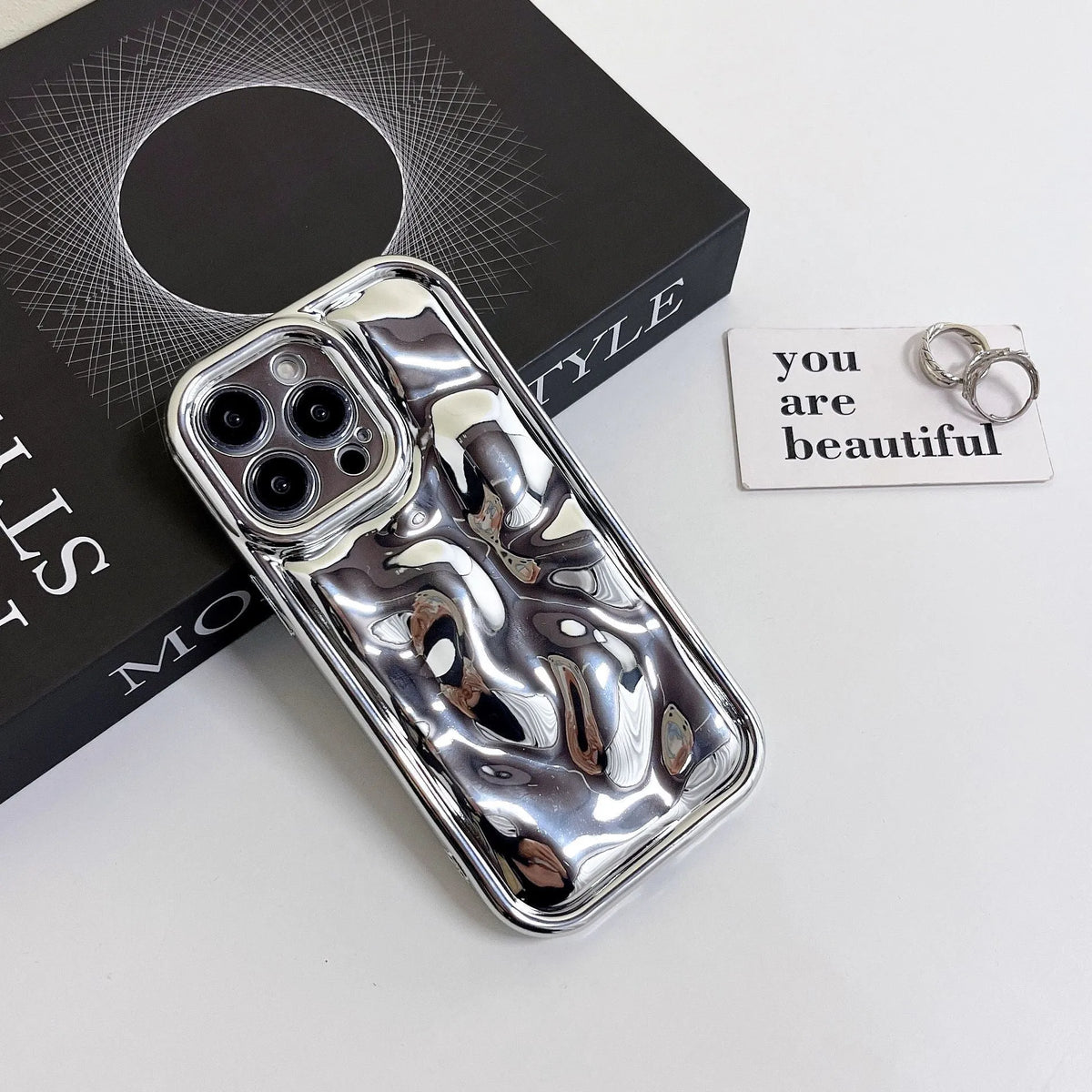 All-inclusive electroplated meteorite pattern TPU phone case for iPhone, shown in black, silver, blue, purple, and rose gold.