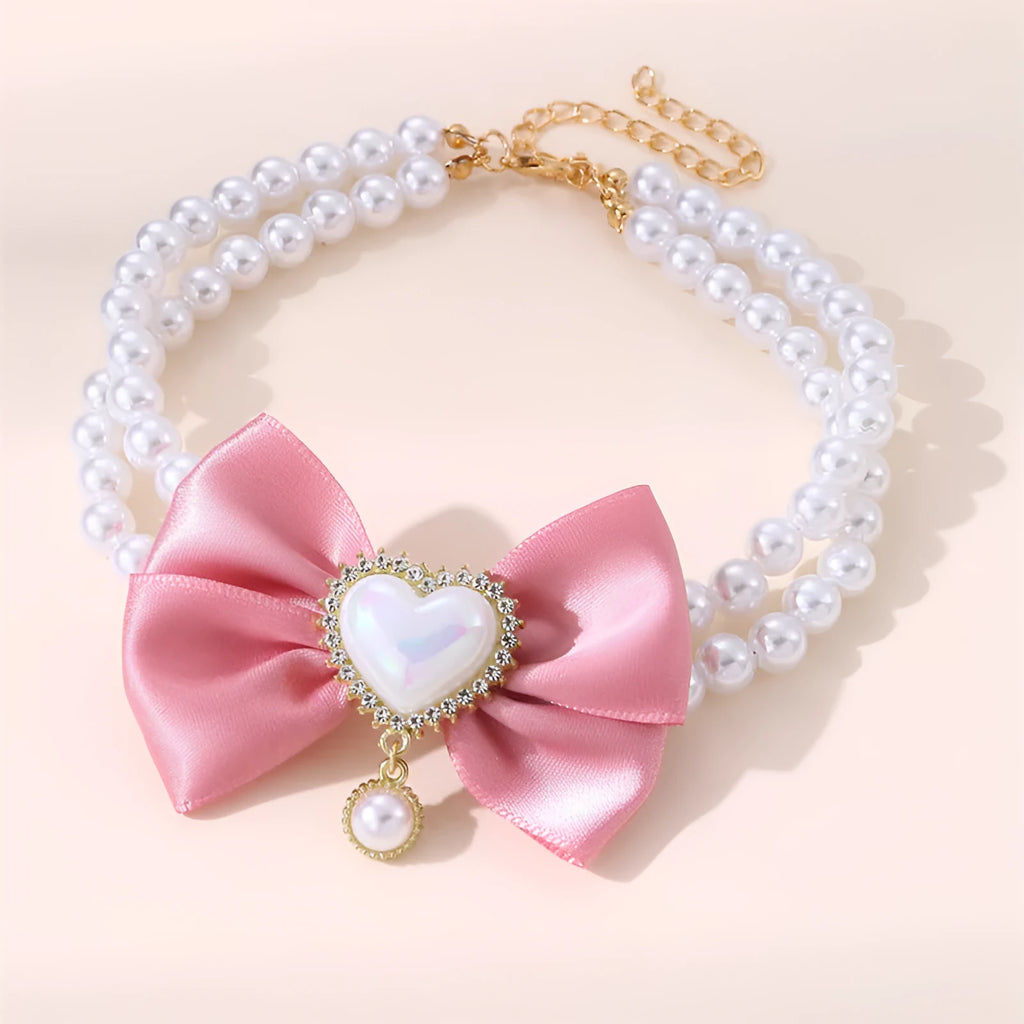 Cute heart shape princess style pet necklace with pearl accents on a cat