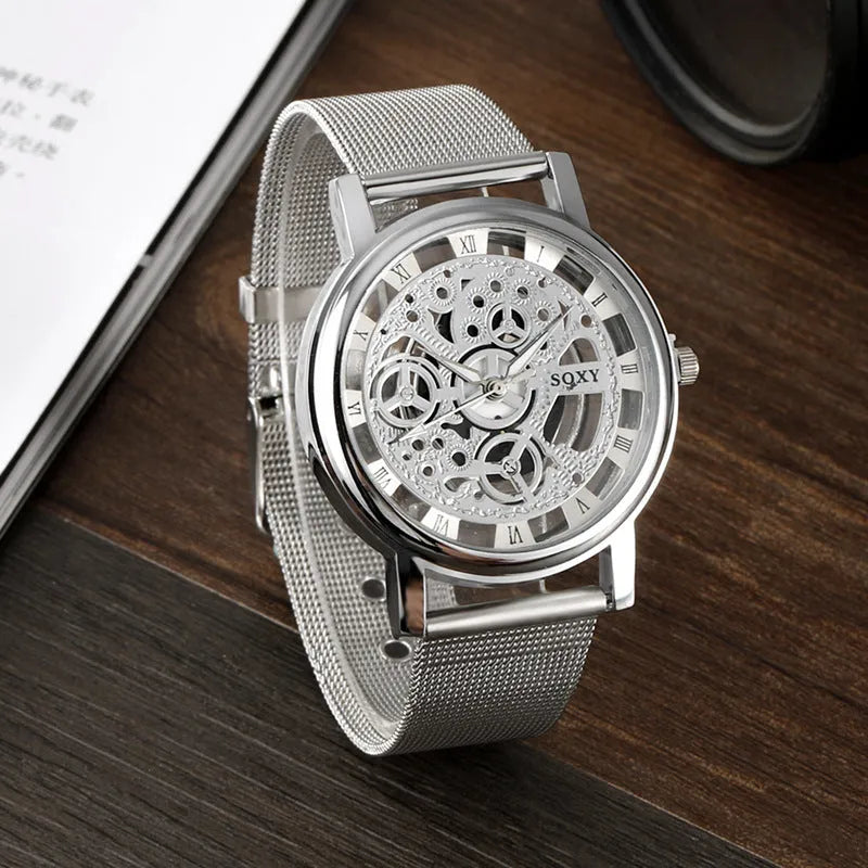 Men's non mechanical watch with hollow cross border design, black dial and simple strap on wrist