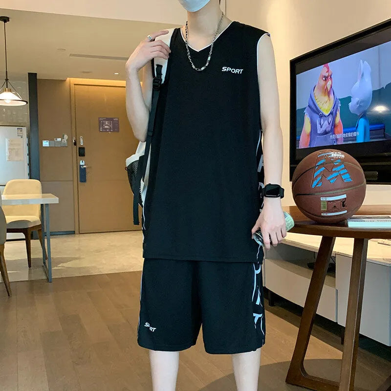 Polyester basketball sports suit with short sleeve vest and matching shorts in various colours