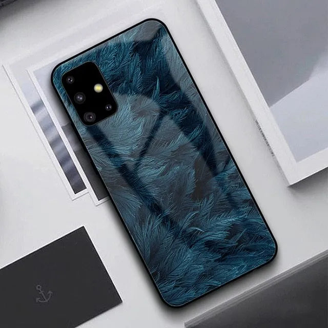 Slim black silicone phone case shown next to a navy blue version for Samsung and iPhone models.