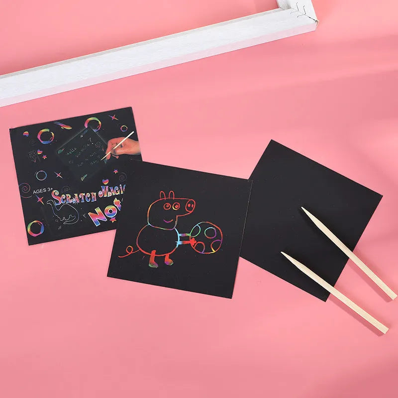 Colourful trumpet scratch art set showing 100 sheets in gift box packaging