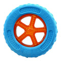 Set of four colourful floating dog toys: a ball, a barbell, and two tyres, on a blue background.