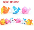Plastic baby tortoise bathroom toy floating in water, random colour, approximately 12 cm long