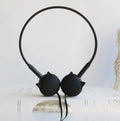 Wireless cat-themed earphones with silicone ear tips in blue colour on a white background
