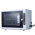Compact silver UV steriliser with stainless steel chamber for salon tools.