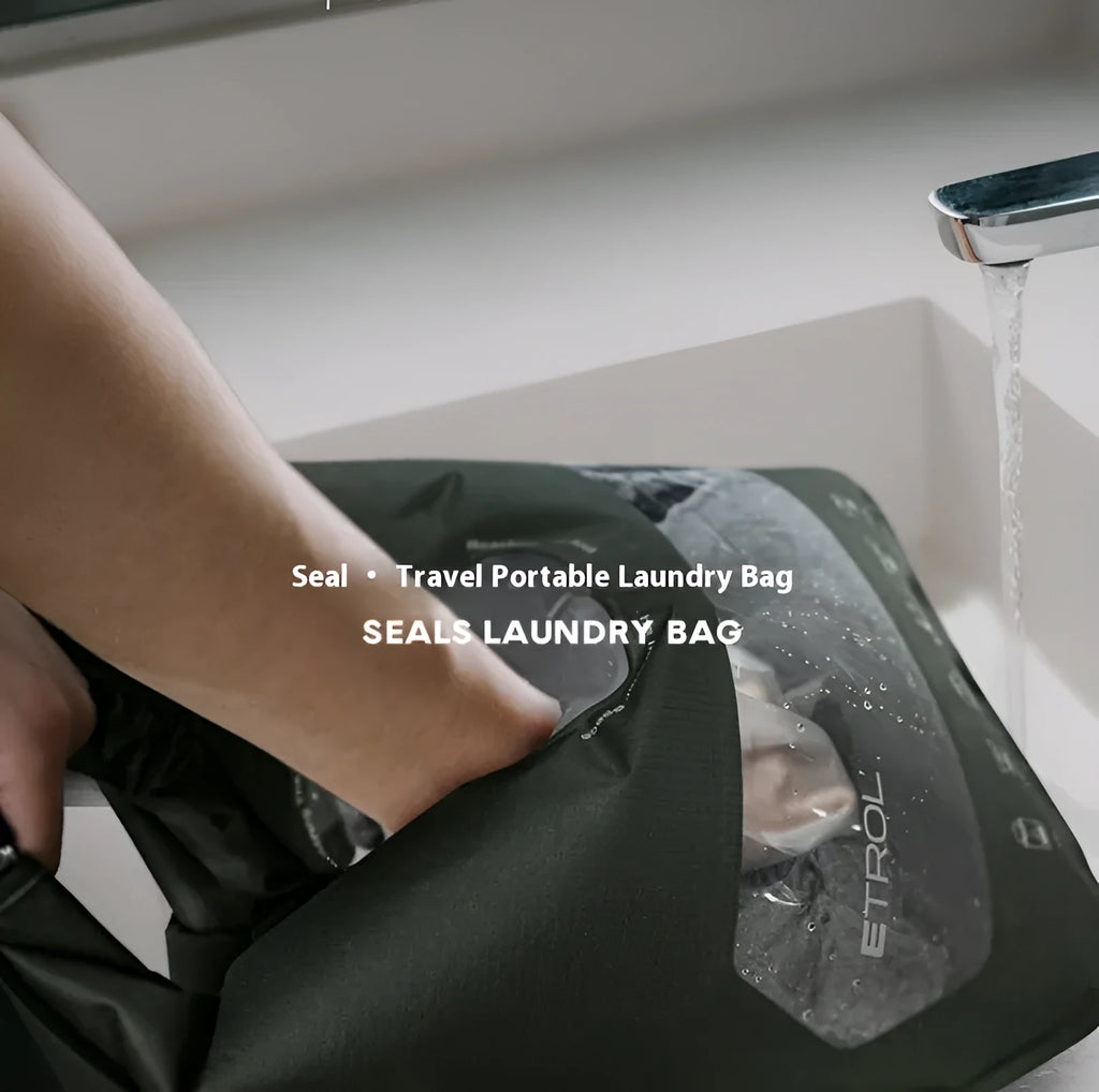 Multi functional portable travel laundry bag in 70D Nylon TPU, folded flat on a table showing its compact size
