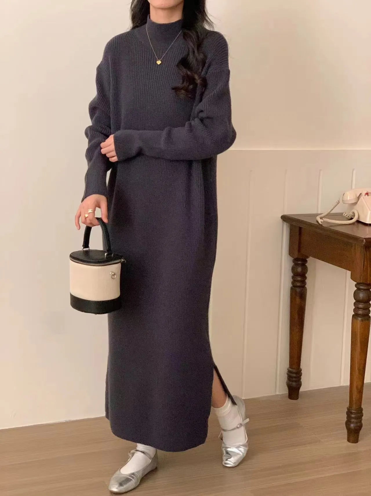 Acrylic half turtleneck knee-length knit dress in khaki colour with long sleeves.