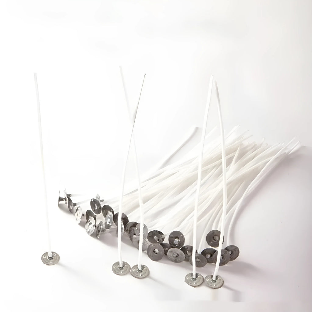 White cotton candle wicks showing tightly woven construction in three lengths: 2.6cm, 6cm, and 8cm
