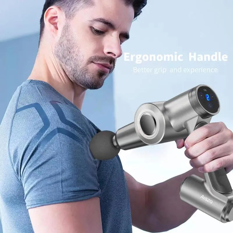 Metallic grey massage fascia gun with six massage heads and black travel case