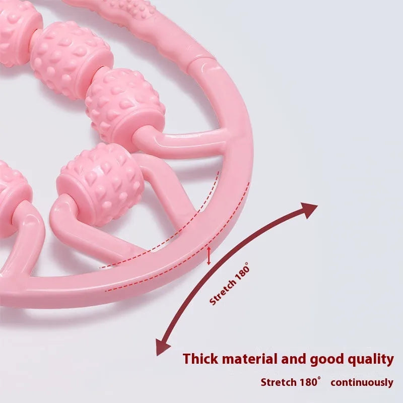 Handheld 12-wheel leg massage roller in macaron pink colour on a white background.