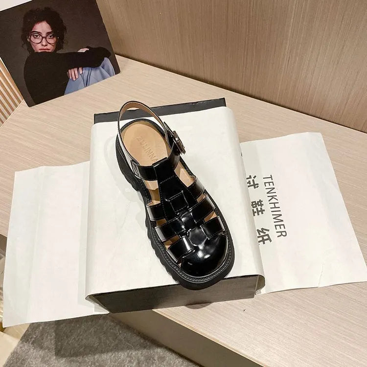 Women's retro closed-toe platform sandals with chunky heel and buckle strap in beige.