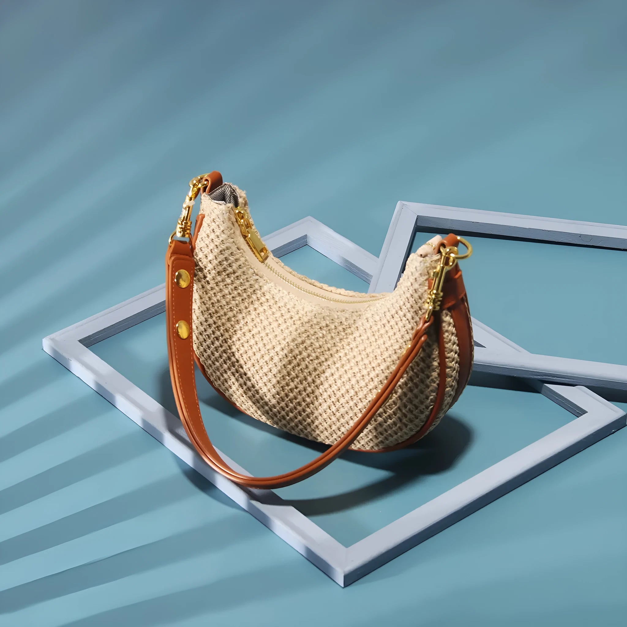Straw-textured women's shoulder underarm bag in brown with visible sewing thread detail and sandwich pocket