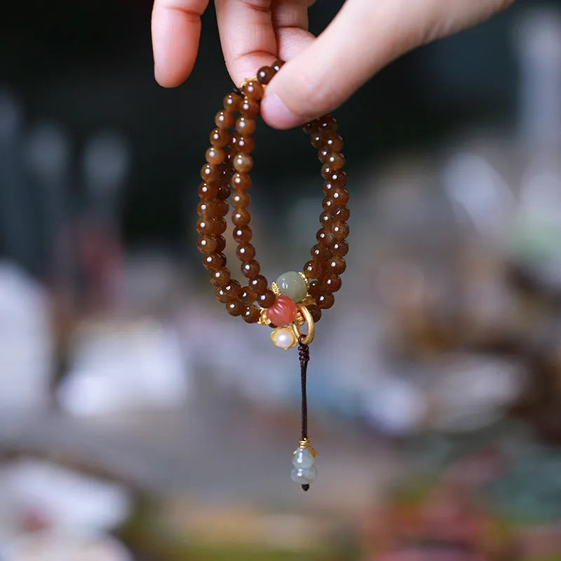 Brown jade Hetian jade three-ring bracelet with butterfly gourd pearl design and silver plated accessories