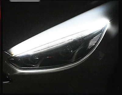Flexible silicone car LED daytime running light strip with flowing turn signal function.
