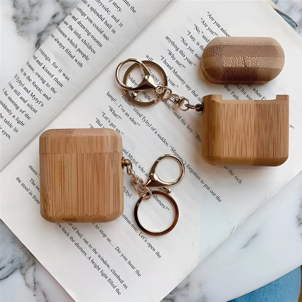 Wood grain clamshell earphone cover for AirPods 1 or 2 in carbonized wood colour, made from wood or bamboo.