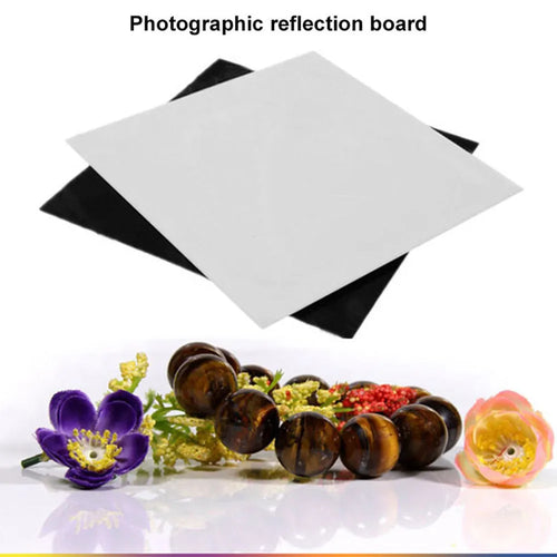 Square black and white acrylic reflection boards for photography in three different sizes.