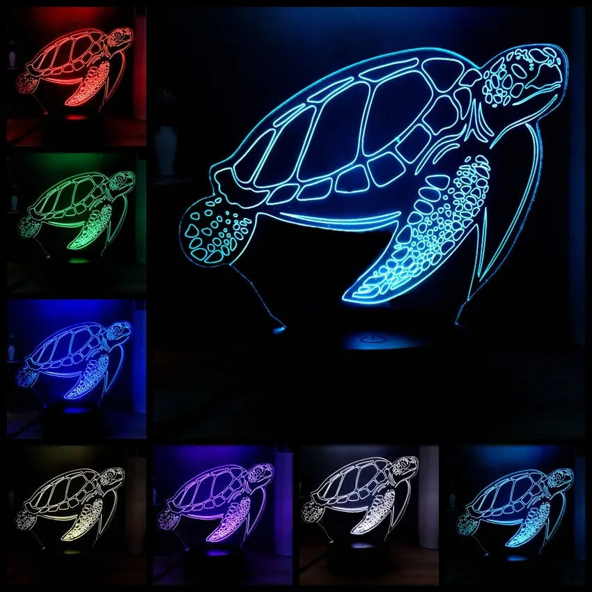 3D acrylic turtle-shaped LED night light with remote control on a bedside table.