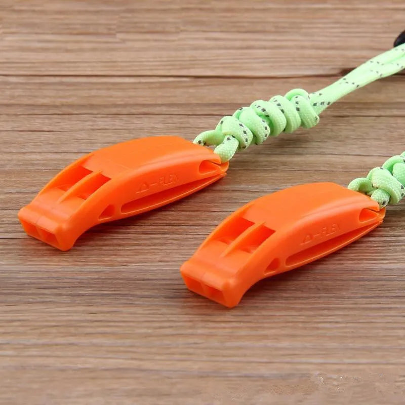Fire survival whistle in black or orange, high impact plastic, 7.2cm x 2cm, with 10cm or 50cm lanyard