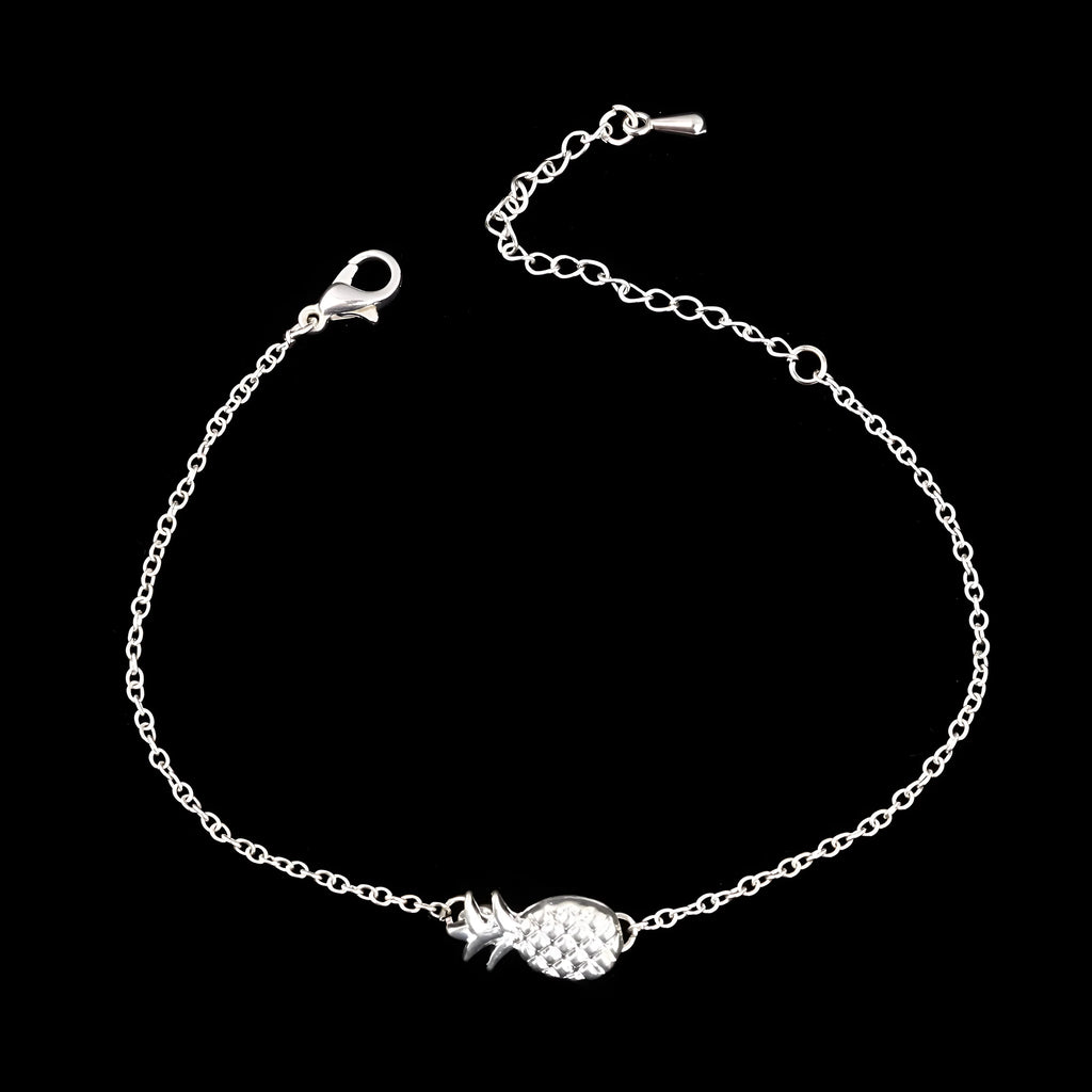 Gold and silver alloy bracelet with a pineapple charm on an adjustable band.