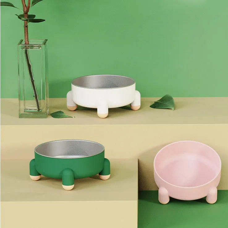 Stainless steel non-slip pet bowl with raised feet in green, pink, and white colour options.