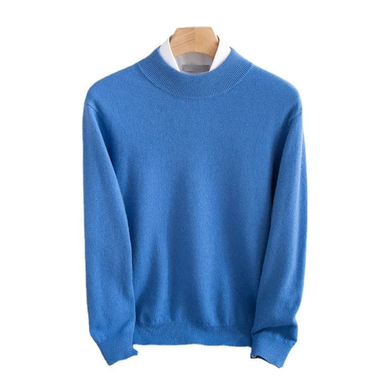 Man wearing a loose-fit half-collar wool sweater in a neutral colour, showing the knitted texture and relaxed fit.
