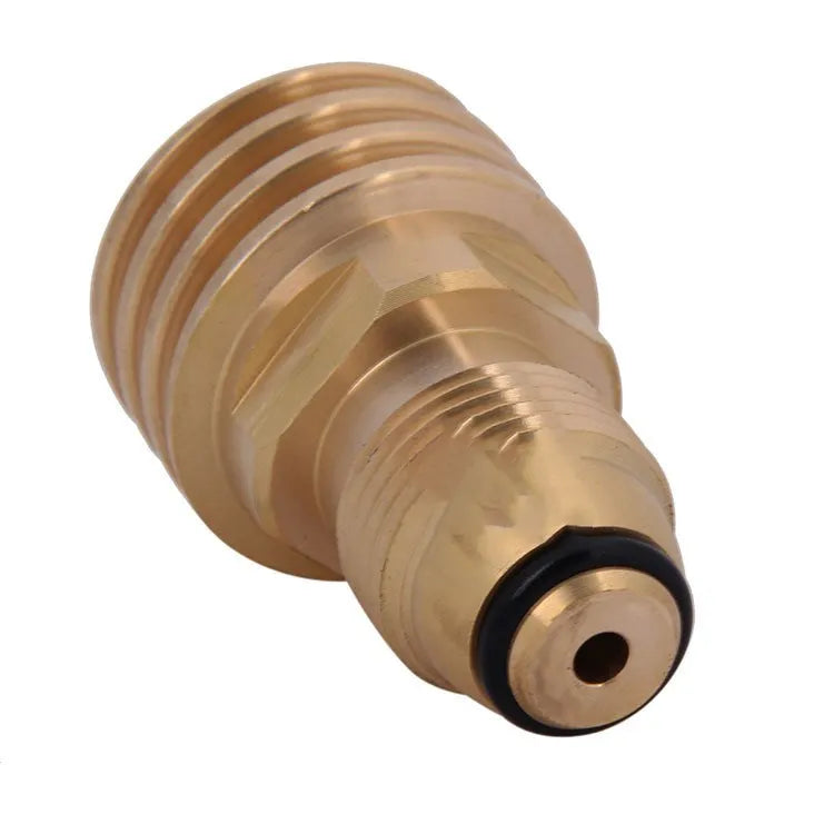 Gold-coloured brass gas adapter with external taper thread for brazier fuel lines.