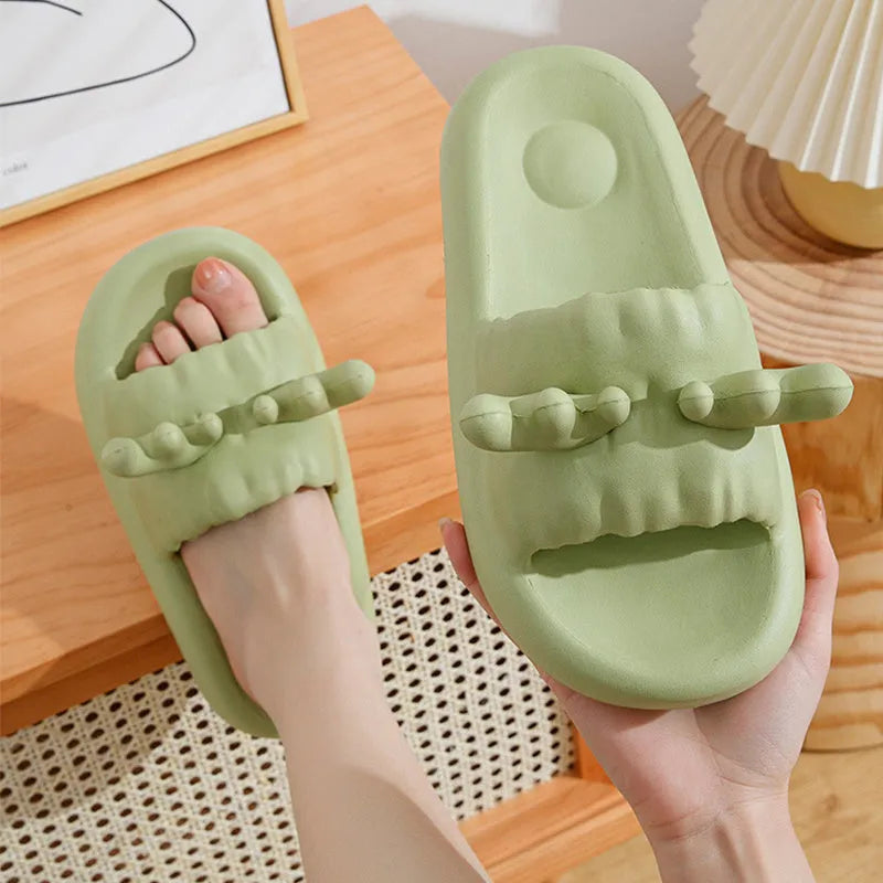 Deer horn design EVA flip flop slippers in light yellow, showing hollow out pattern and non-slip sole.