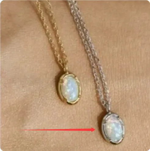 Oval jelly opal geometric pendant on a sterling silver chain with gold plating.