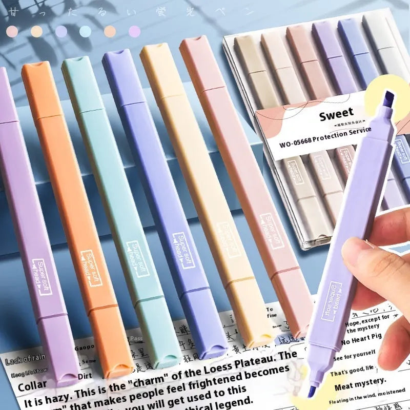 A set of double-ended fluorescent marker pens showing two coloured tips, arranged in a pack.