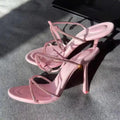 Women's rhinestone cross strap stiletto high heels in black with pointed toe and 9cm heel