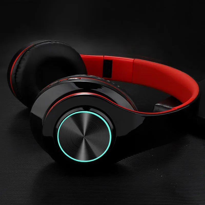 Wireless Bluetooth headset in five colour options showing head-mounted design with stereo earpieces