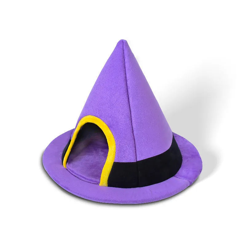 Purple cloth witch hat-shaped cat nest bed for pets, showing its wide brim and cosy interior.