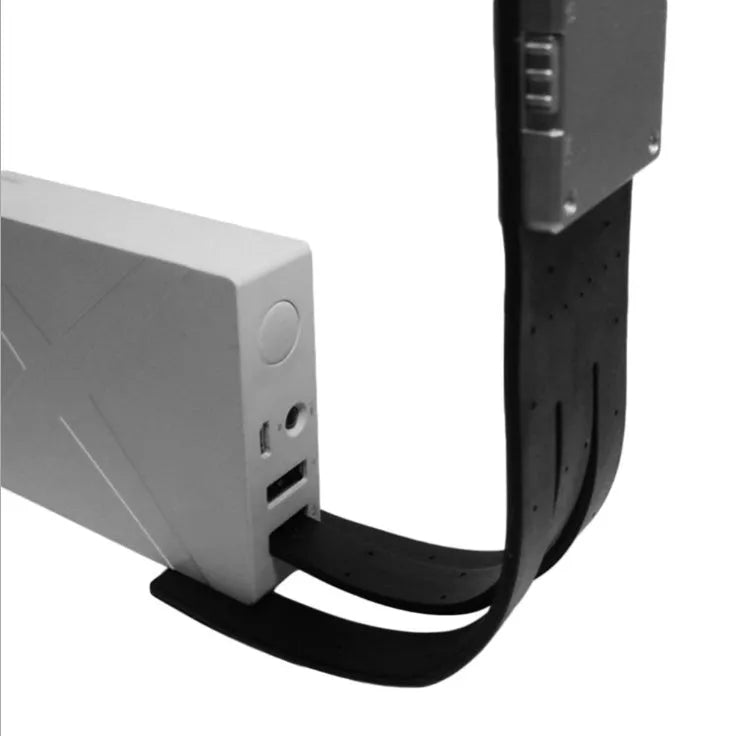 Black folding LED reading lamp showing extended 205mm length and adjustable brightness settings