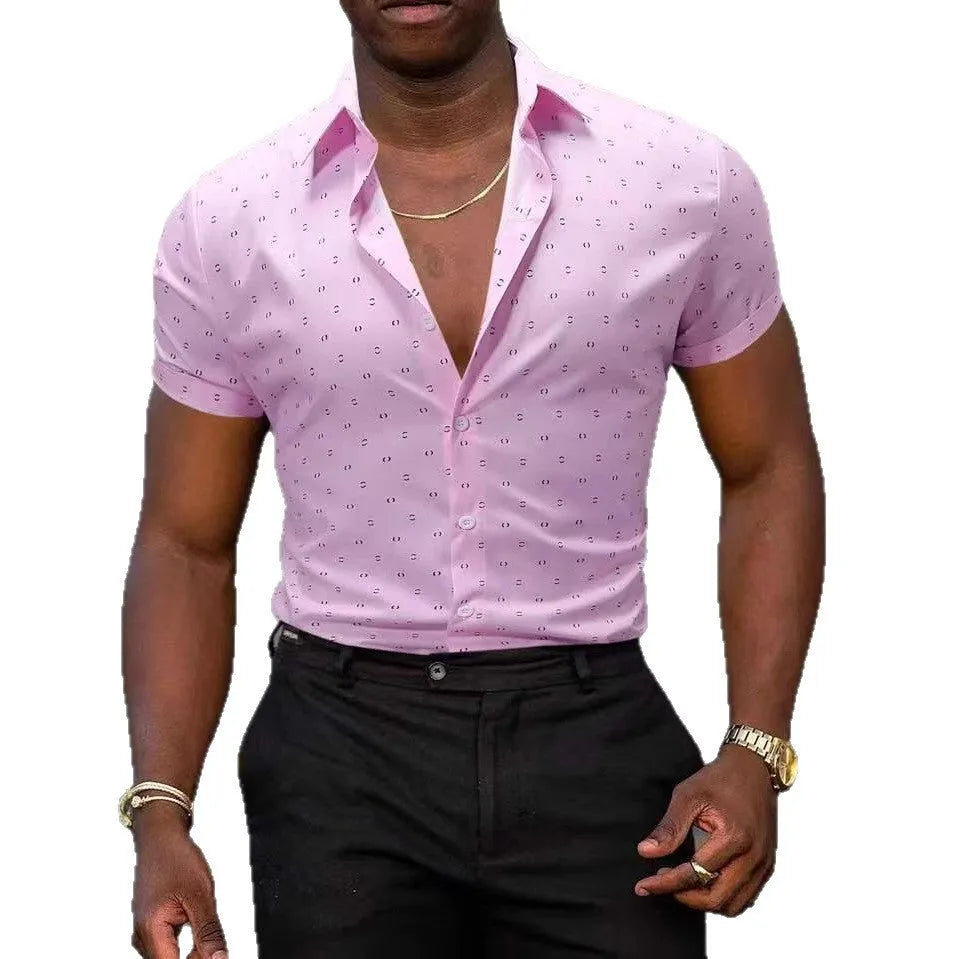 Man wearing a light blue short-sleeved casual shirt with a floral print, made from stretch polyester fabric.
