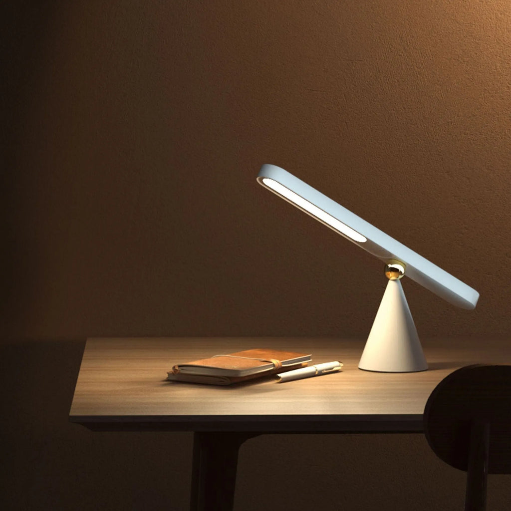 Geometric white desk lamp with magnetic base and touch controls for reading and ambient lighting