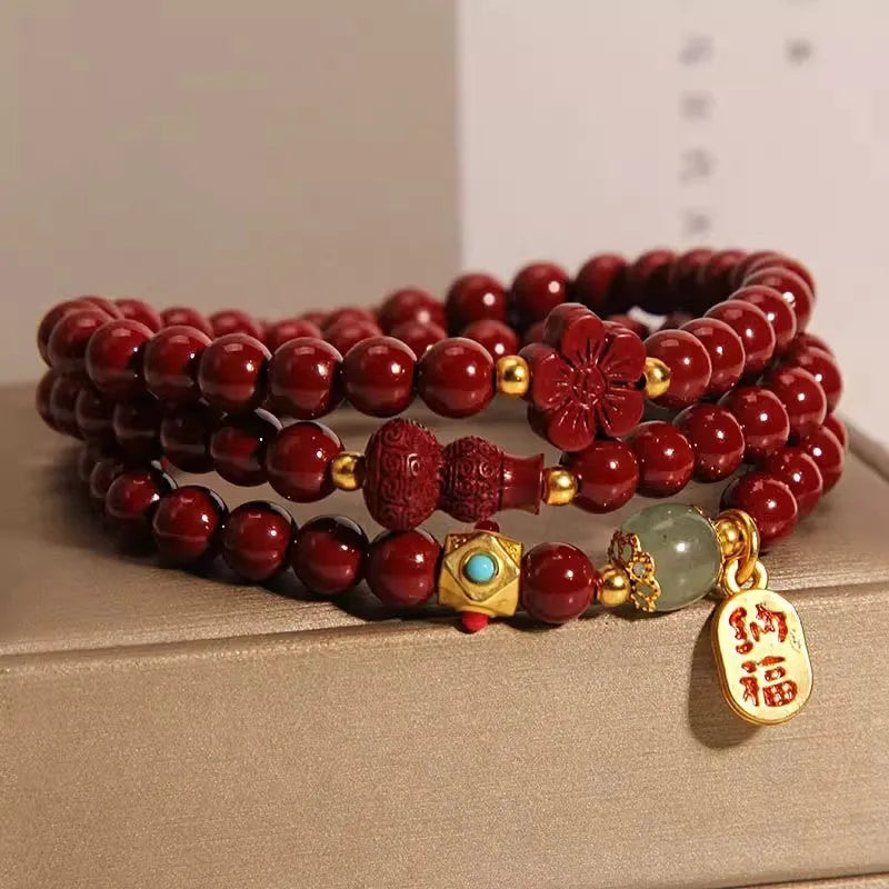 Women's multi-circle cinnabar bracelet with gourd and five petal flower design